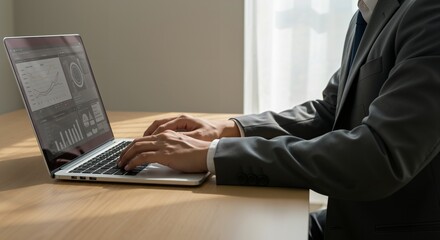 A Professional Man Engaged in Data Analysis at a Modern Office Workspace, Utilizing Technology to Drive Insights and Innovation
