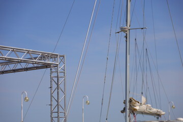 Steel structure and ship mast in the background