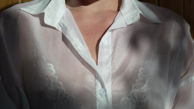 Sheer Shirt Lace Fabric Woman wearing transparent white button up shirt showing skin underneath