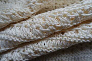 Rippled light beige handmade crochet lacy fabric