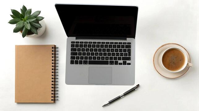 Minimalist flat lay of laptop, notebook, coffee cup, and plant, ideal for work from home setups, productivity blogs, tech ads, and business or creative workspace visuals