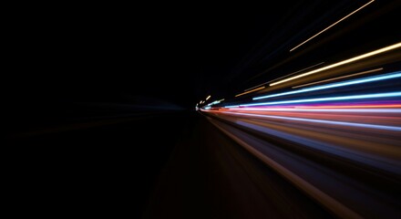 Abstract colorful light streaks glowing against a black background, radiating speed and vitality. Copy space