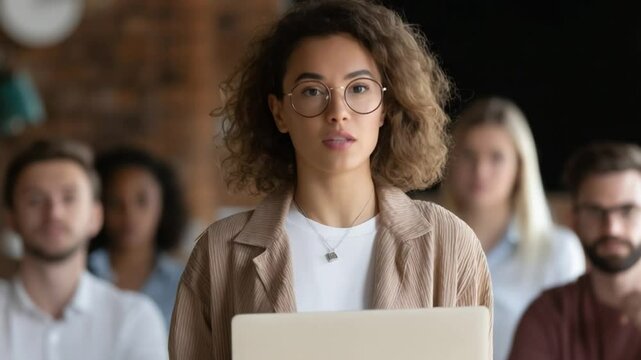 Leadership and Presentation: A composed professional woman, central focus, delivering a presentation.