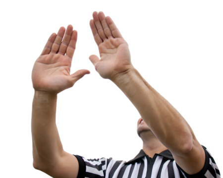 A male referee with short brown hair raises both hands in a signaling gesture. He wears a black and white striped shirt. The background is transparent.
