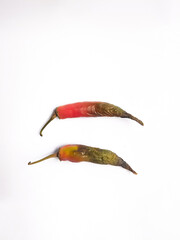 Rotten red chili with black color at the tip of the fruit