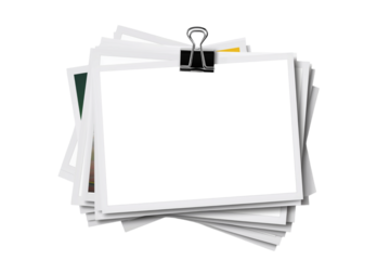 バインダークリップで束ねられた写真の、画像合成用素材