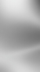 Abstract silver gradient background with subtle light variations and grainy texture creating a metallic appearance