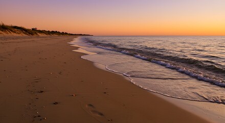 Serene Sunset Beachscape: Tranquil Coastal Scene at Dusk