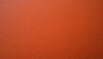Fototapeta premium Detailed close up of a textured rust orange fabric with natural weave pattern