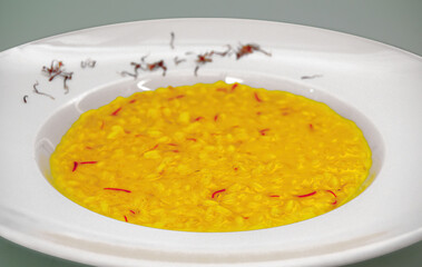 Saffron risotto served on elegant white plate