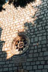 Architectural detail of old church in Omisalj town, Krk island, Croatia