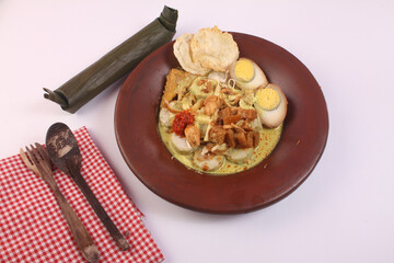 a plate of lontong opor