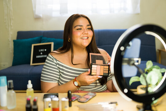 Plus size influencer creating makeup content for social media