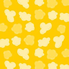 Seamless cartoon popcorn pattern with hand-drawn, irregular shapes in soft yellow tones. Suitable for snack packaging, textile design, or children’s backgrounds.