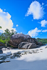 empty and scenic beautiful beach of baie lazare, white sandy beaches with huge stones, Mahe Seychelles 8