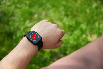 Smart watch on hands of athlete for sports workout, heartbeat info or fitness progress on app....