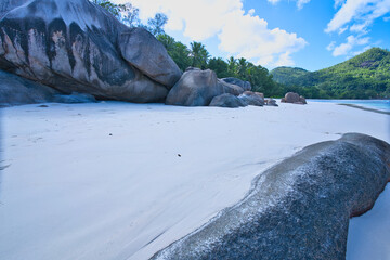 empty and scenic beautiful beach of baie lazare, white sandy beaches with huge stones, Mahe...