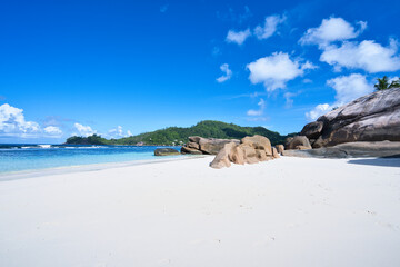 empty and scenic beautiful beach of baie lazare, white sandy beaches with huge stones, Mahe...
