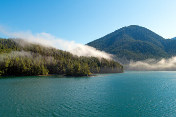 Landscape along Inside Passage cruise with mist and fog between Prince Rupert and Port hardy,...