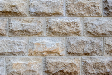Modern brick wall texture natural stone close-up, architectural backgrounds, interior design, construction, renovation, durability, ancient aesthetics