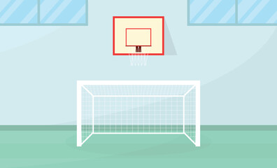 Interior of a school gymnasium with football goals and a basketball hoop.