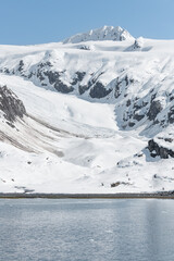 Fototapeta premium Snow Covered Glacier above the Harvard Arm in College Fjord, Alaska, USA
