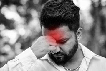 Burning-out, overworked, tired, stressed South Asian, Indian man feeling bad, having stressed emotion, mental health, with red danger alert effect