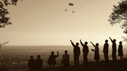 Vintage 1950s UFO sighting. Sepia-toned image of a crowd pointing at flying saucers in the sky.