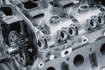 disassembled silver car engine auto service concept background.