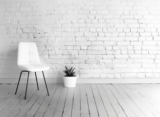 Modern minimalist room featuring a white chair and potted plant against a white painted brick wall and wooden floor.