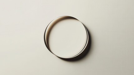 Minimalist Artistic Representation of a Circular Form with Soft Shadows on an Abstract Background for Design and Creative Projects