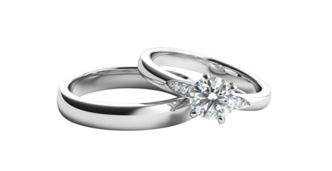 Sleek, polished platinum engagement and wedding rings, featuring a large center diamond and smaller accent stones