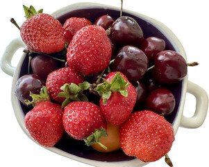 Fresh strawberries and juicy cherries in a ceramic bowl on a white background, png, object. Summer...