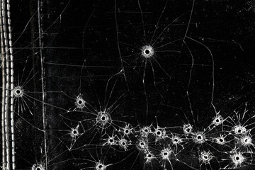 Bullet holes on black glass, overlay design background