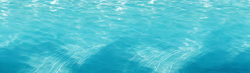 Clear turquoise water surface with sun reflections &ndash; tropical sea background