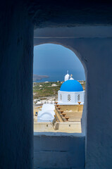 Santorini Island. Traditional Cycladic architecture, stunning volcanic cliffs, tropical waters and...