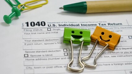 U.S. Individual Income Tax Return forms paper tax day 18 april concept United States American holiday