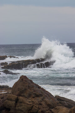 waves breaking on the rocks