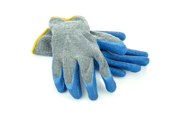 Pair of gray and blue work gloves with yellow trim. Protective wear for manual labor and safety. isolated on white background with clipping path.