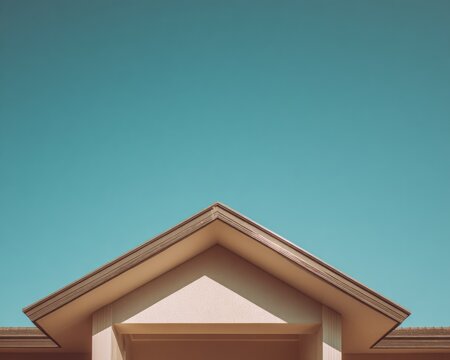 Exterior roof of modern house against a clear blue sky