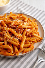 Homemade Pasta Bolognese with Cheese on a Plate, side view. Close-up.