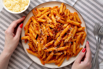 Homemade Pasta Bolognese with Cheese on a Plate, top view.