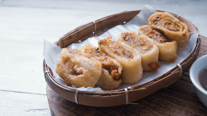 Gohyong is typical chinesse food served with sliced ​​chilies and cuko sauce.