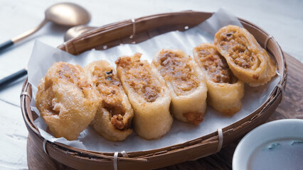 Gohyong is typical chinesse food served with sliced ​​chilies and cuko sauce.