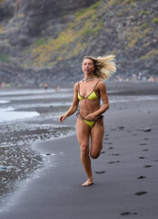 Woman jogging on the beach