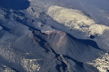 Stunning Aerial View of Volcanic Landscape with Black Lava and green Grass