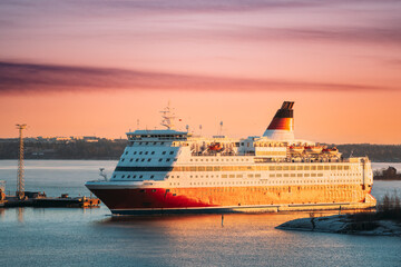Helsinki, Finland. View Of Modern Ferry Ferryboat Floating Island At Sunrise Sky