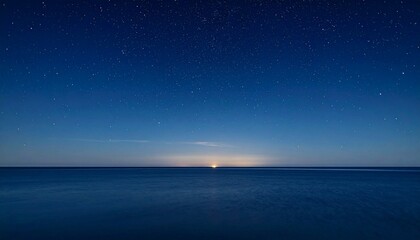 Deep indigo sky scattered with crisp starlight, glowing softly above a minimal horizon line in perfect stillness.