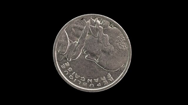 France 1955 100 francs coin obverse with the bust of Liberty holding a torch rotating on black background