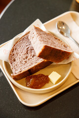 Homemade sourdough bread slices and jam. High protein flour.